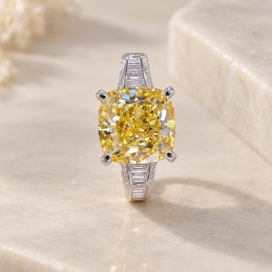 5ct Yellow Cushion Diamond Pavé Engagement Ring with Emerald Cut Accent Diamonds in Platinum